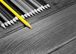 Black And White Image Of Colored Pencils With Isolated Yellow Pe Stock Photo