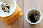 Black Coffee With Coffee Grinder Stock Photo