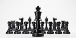 Black King Chess With Others Isolate For Business Concept - Stra Stock Photo