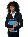 Black Woman Holding Clipboard Stock Photo
