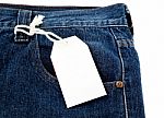 Blank Price Tag On Jeans Stock Photo