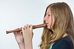 Blonde Dutch Teenage Girl Playing Flute Stock Photo