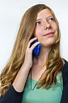 Blonde Teenage Girl Phoning Mobile Stock Photo
