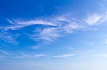 Blue Sky And Tiny Cloud Background Stock Photo