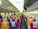 Blury Shot  Inside Wide Body  Airplane With Passenger Stock Photo