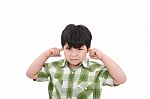 Boy Closed His Ears Stock Photo