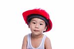 Boy In A White Singlet Wearing Red Helmet Stock Photo