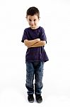 Boy Standing With Crossed Arms Stock Photo
