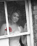 Bride At Window Stock Photo