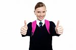 Bright Student Showing Thumbs Up Sign Stock Photo