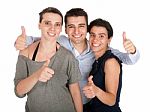 Brother And Sisters Showing Thumbs Up Stock Photo