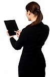 Business Executive Operating Touch Pad Stock Photo