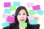 Business Lady Thinking With Note Stock Photo