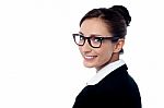 Business Lady Turning Back With A Smile Stock Photo