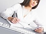 Business Lady Writing On Notebook Stock Photo