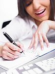 Business Lady Writing On Notebook Stock Photo