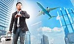 Business Man And Belonging Luggage Watching To Sky And Hand Watch Against High Building Skyscrapers And Passenger Plane Flying Above Use For Aircraft ,air Transportation ,traveling Of People Theme Stock Photo