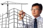 Business Man Drawing Construction Site Stock Photo