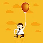 Business Man Flying With Balloon Stock Photo