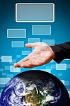 Business Man Give The Hand To Earth Stock Photo