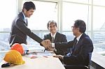Business Man Shaking Hand After Successful Project Solution Planing Meeting Shot In Office Meeting Room Stock Photo