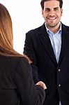 Business Man Welcomed By Women Man On Focus Stock Photo