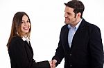 Business Man Welcoming A Women By Shake Hands Stock Photo