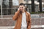 Business Man With A Smart Phone Stock Photo