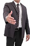 Business Man With Hand Extended To Handshake - Isolated Over Whi Stock Photo