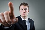 Business Man With Pointing To Something Or Touching A Screen Stock Photo