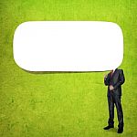 Business Man With Speech Bubble Stock Photo