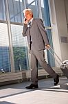 Business Man With Trolley Stock Photo