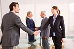 Business People Shaking Hands Stock Photo