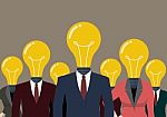 Business People With A Light Bulb Head Stock Photo