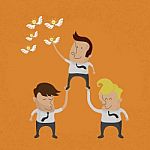 Business People Working As A Team To Grab The Idea Stock Photo