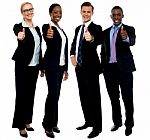 Business Team Showing Thumbs Up Stock Photo