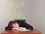Business Woman Sleeping At A Desk Stock Photo