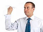 Businessman Holding Paper Airplane Stock Photo