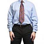 Businessman In Blue Shirt Stands With Hands On The Hips Stock Photo