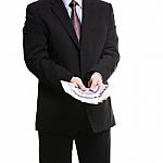 Businessman In Dark Suit With A Bunch Of British Pounds Sterling Stock Photo
