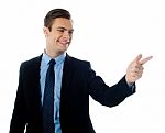 Businessman Pointing Right Stock Photo
