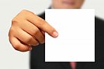 Businessman Showing Blank Paper Stock Photo