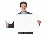 Businessman Showing Empty Board Stock Photo