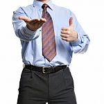 Businessman Showing Empty Hand And Thumb Up Stock Photo