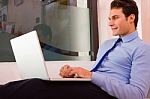 Businessman Sitting Couch Using Laptop Stock Photo