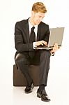 Businessman Sitting With Laptop Stock Photo