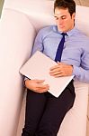 Businessman Sleeping Couch Holding Laptop Stock Photo