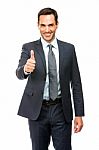 Businessman Smiling Thumb Up Stock Photo