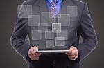 Businessman Use Touch Pad For Pay Something Stock Photo