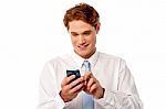 Businessman Using Mobile Phone Stock Photo